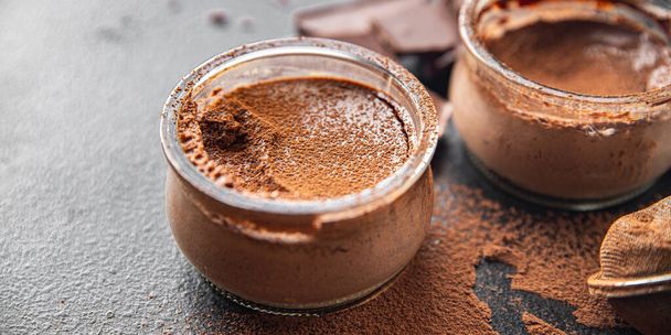 chocolate pudding souffle cocoa cream, cream, vanilla sweet dessert healthy meal food snack on the table copy space food background rustic top view - Fotó, kép