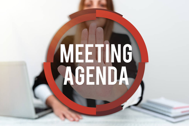 Writing displaying text Meeting Agenda. Business idea An agenda sets clear expectations for what needs to a meeting Assistant Offering Instruction And Training Advice, Discussing New Job - Foto, Bild