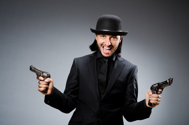 człowiek ubrany kapelusz vintage z pistoletu - Zdjęcie, obraz