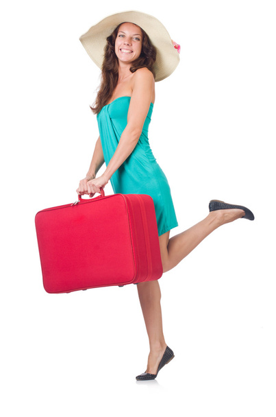 Vrouwelijke reiziger met koffer geïsoleerd op wit - Foto, afbeelding