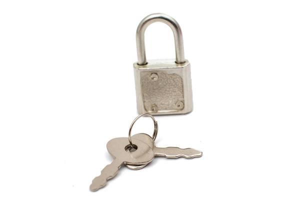 Metal padlock with keys on a ring  - Photo, Image