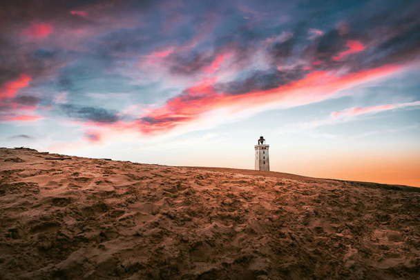 lighthouse at the beach in the evening - Photo, image