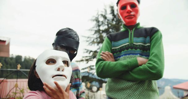 children in face masks in park  - Foto, Imagem