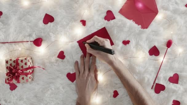 man with love letter for st valentine day cropped video  - Filmati, video