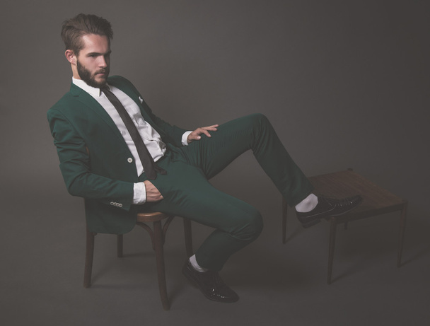 Business fashion man wearing green suit with white shirt black a - Photo, Image