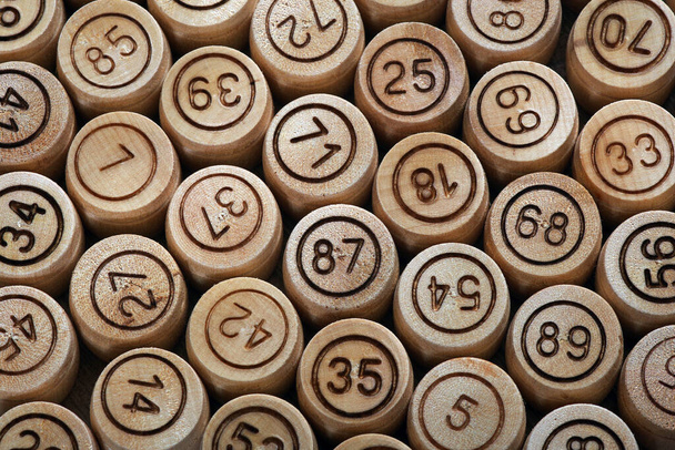 Lotto game. Wooden lotto barrels background. close up. top view - Photo, Image