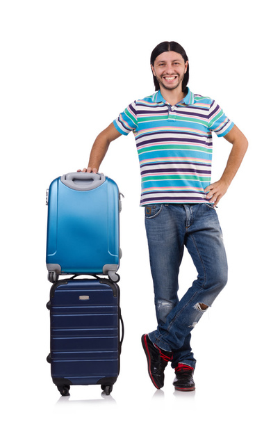 Joven viajando con maletas aisladas en blanco - Foto, imagen
