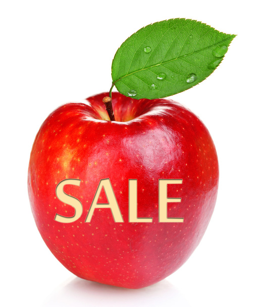 Sale concept. Juicy red apple isolated on white - Photo, Image