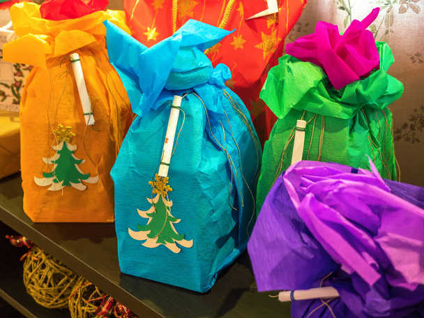 Group of Christmas presents wrapped in colorful wrapping paper - Foto, immagini