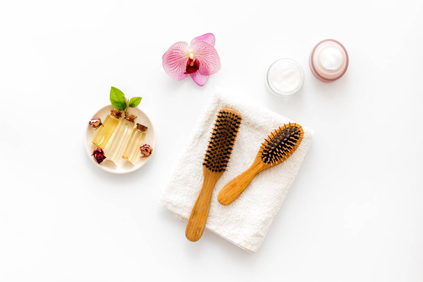 Hair care products with brush flat lay, top view - Fotografie, Obrázek