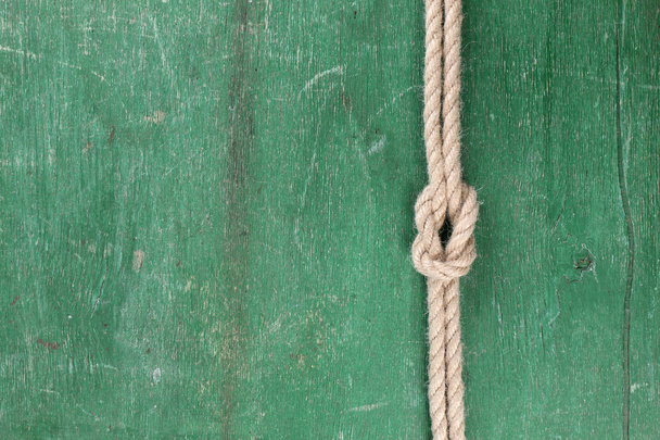 Marine knot on color wooden background - Fotografie, Obrázek