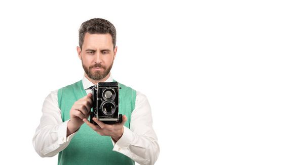Fotograf macht Foto mit professioneller Kamera isoliert auf Weiß, Kopierraum, Fotografie. - Foto, Bild