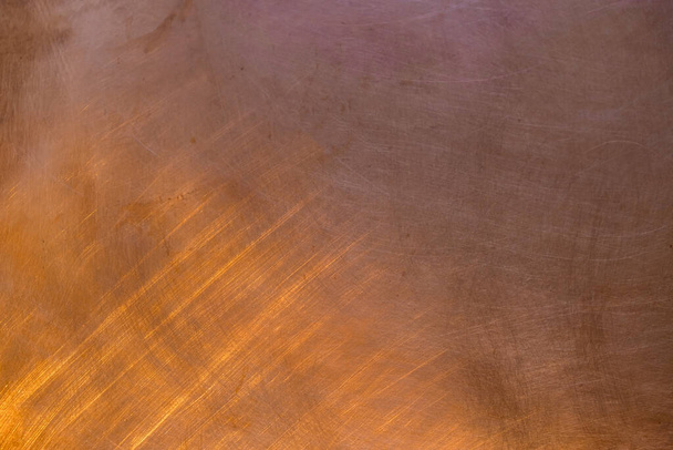 Copper reflects sunlight. The texture of a copper plate. - Foto, Bild