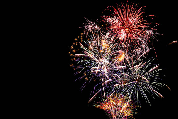 New year celebration fireworks against night sky. Copy space. Happy new year 2022. - Zdjęcie, obraz