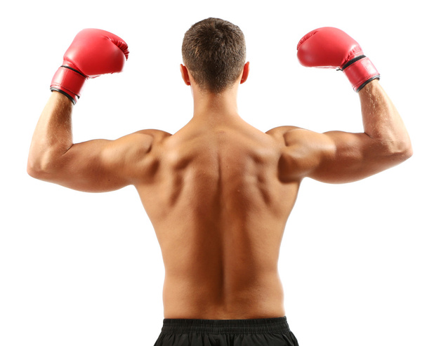 Handsome young muscular sportsman with boxing gloves isolated on white - Photo, image