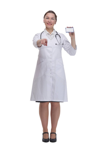 in full growth.medical doctor woman showing her visiting card. - 写真・画像