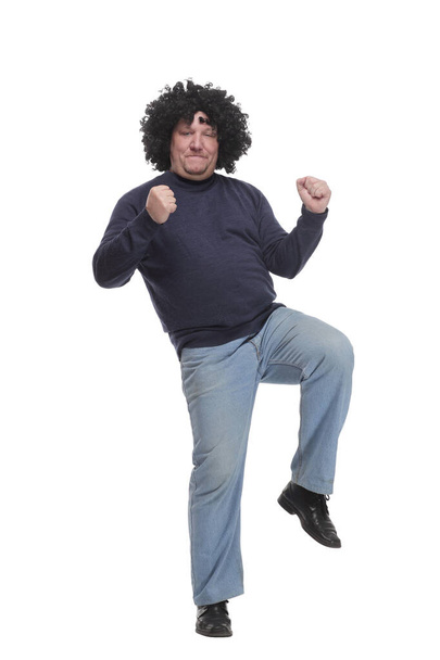 full-length. cheerful mature man in a wig. - Фото, изображение