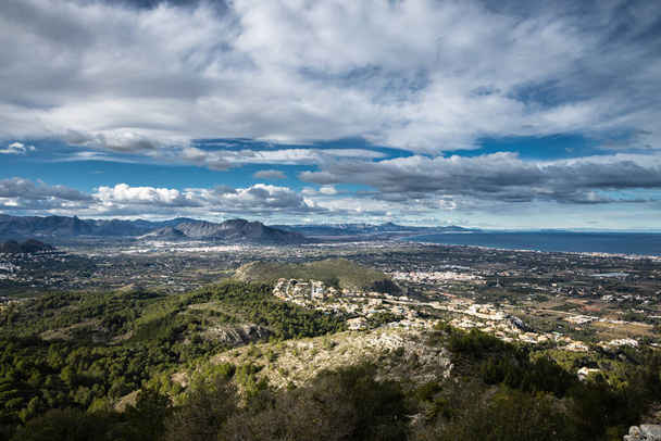 Landscape view of the mountains and clouds, beautiful nature of Montgo mountain, Spain - Photo, image