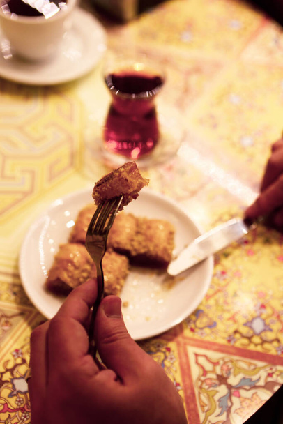 Traditional turkish dessert baklava with cashew, walnuts. Homemade baklava with nuts and honey. - Фото, изображение