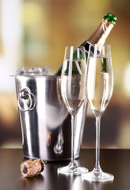 Champagne in glasses and bottle in restaurant - 写真・画像