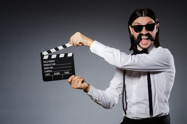 Funny man with movie clapboard - Photo, Image