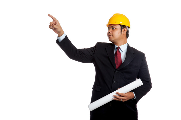 Asian engineer man hold blueprint and point up - Zdjęcie, obraz