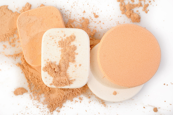 powder and cosmetic sponges on white  - Foto, imagen