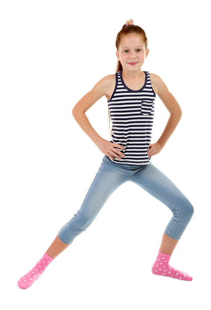 Little girl doing exercises - Фото, изображение