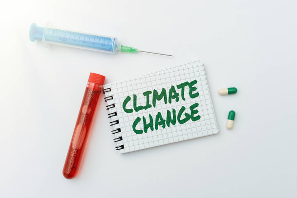 Hand writing sign Climate Change. Word for Increase in global average temperature Weather transformation Research Notes For Virus Prevention, Planning Medical Procedures - Foto, immagini