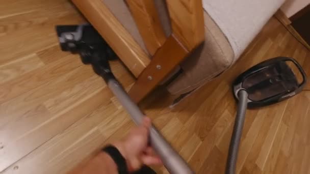 Vacuuming Under The Sofa - Footage, Video