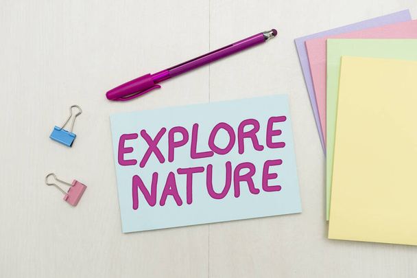 Conceptual caption Explore Nature. Business overview Reserve Campsite Conservation Expedition Safari park Flashy School Office Supplies, Teaching Learning Collections, Writing Tools, - Фото, изображение