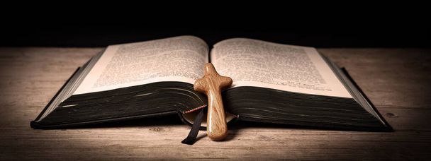 Church faith Christian background banner panorama - Old holy bible and cross on old rustic vintage wooden table - 写真・画像