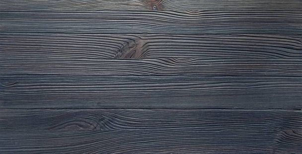 Texture of a wooden surface dark brushed board - Photo, image