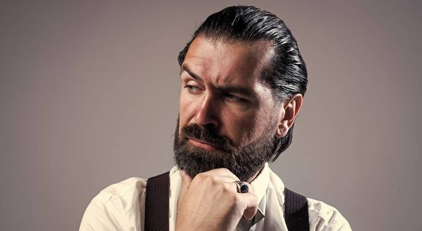 masculinity and charisma. formal party dress code. old fashioned bearded hipster. hairdresser concept. brutal handsome man with moustache. mature barber in retro style - Photo, image