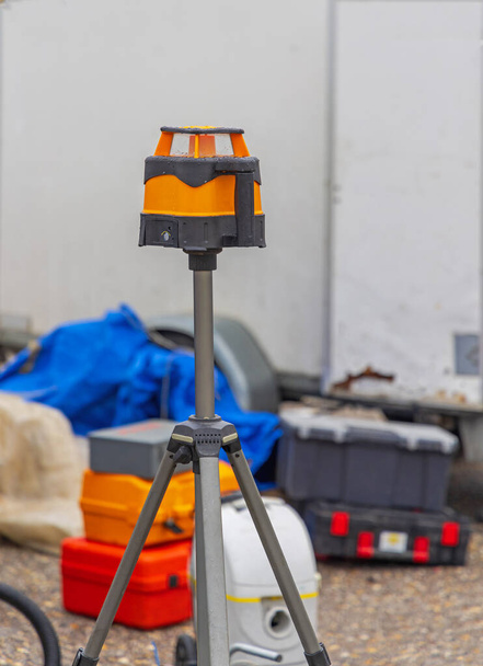 Laser Level Measuring Device at Tripod Construction Site - Photo, Image
