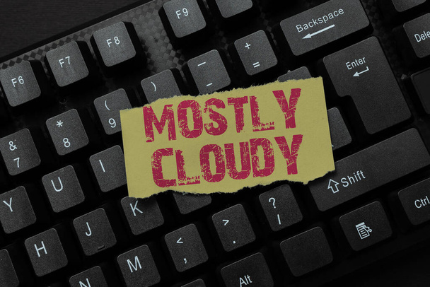 Sign displaying Mostly Cloudy. Word for Shadowy Vaporous Foggy Fluffy Nebulous Clouds Skyscape Abstract Typing New Movie Script, Creating Motivational Speech Online - Фото, изображение