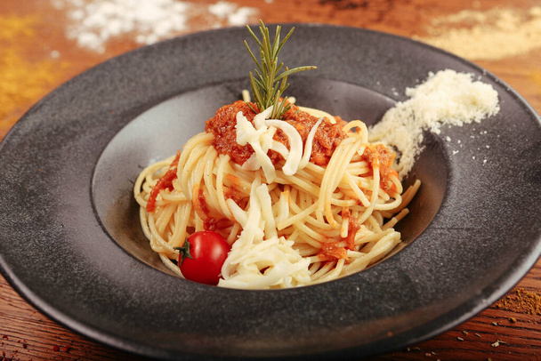 Tasty appetizing classic Italian pasta with a delicious sauce. - Foto, Imagem