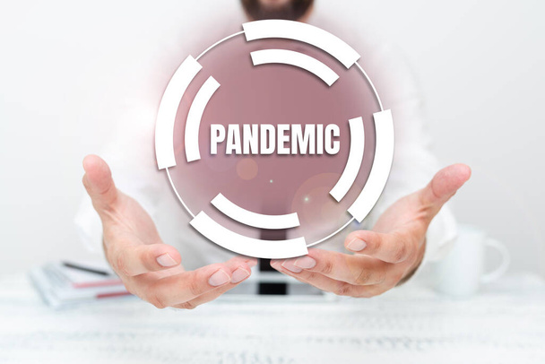 Handwriting text Pandemic. Business approach occurring over a wide area affecting high proportion of population Presenting Communication Technology Smartphone Voice And Video Calling - Photo, Image