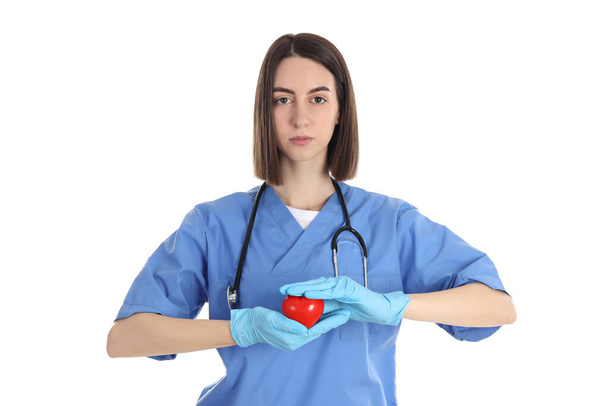 Female nurse with heart isolated on white background - Photo, image