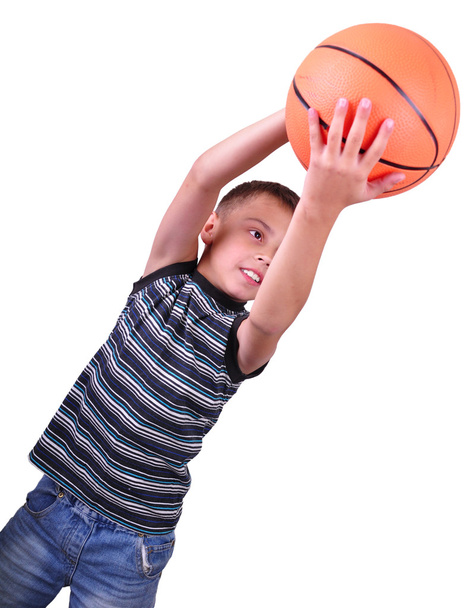 boy, basketball player makes a throw with a ball - Фото, изображение