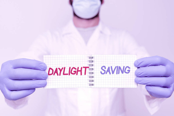 Writing displaying text Daylight Saving. Business concept Storage technologies that can be used to protect data Scientist Presenting New Research, Chemist Planning Advance Procedures - Foto, Bild