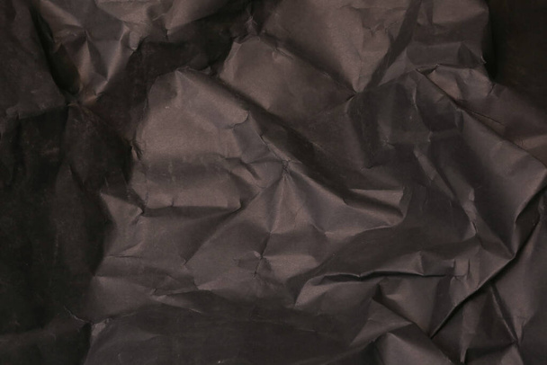 black creased crumpled paper background grunge texture backdrop - Valokuva, kuva