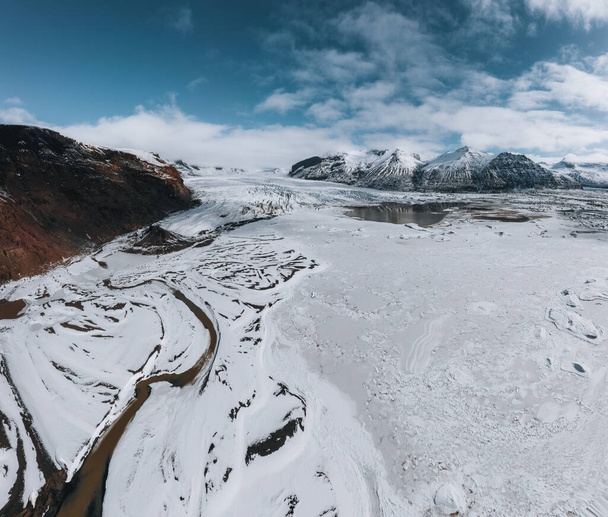 Aerial drone panorama of Iceland Glacier Svinafellsjokul and Vatnajokull in Southern Iceland. Blue sky on a sunny winter day with snow and ice. - Foto, immagini