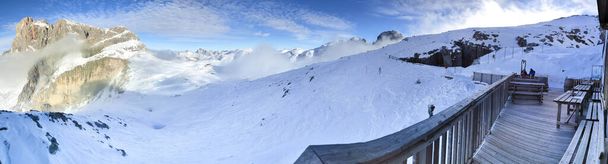 Cimon della Pala and Cima Vezzana on Dolomites in Trentino Alto Adige with blue sky background during winter season and snomy lanscape - 写真・画像