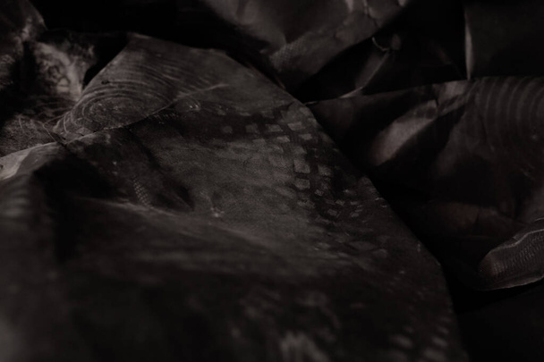 black creased crumpled paper background grunge texture backdrop - Фото, зображення