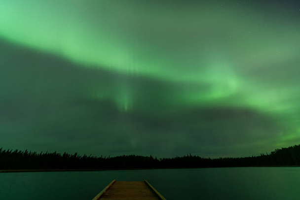 Aurora explosion in Saskatchewan Canada very colorful pulsating - Photo, Image