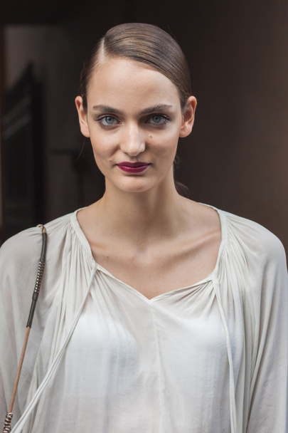Beautiful model outside Trussardi fashion shows building for Milan Women's Fashion Week 2014 - Zdjęcie, obraz