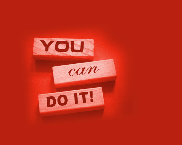 YOU CAN DO IT word on wooden blocks on gray background. Motivation affirmation encouraging words for personal achievements concept. - Valokuva, kuva