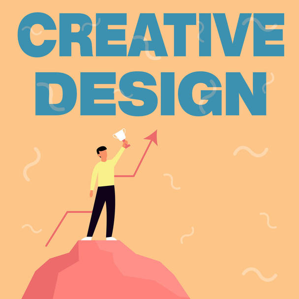 Sign displaying Creative Design. Business overview a visual element which satisfies its main objective Businessman Drawing Standing On Big Rock Proudly Holding Trophy. - Foto, immagini