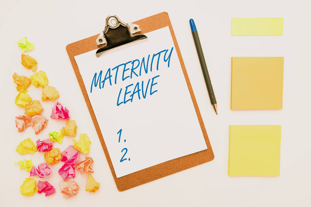 Inspiration showing sign Maternity Leave. Conceptual photo a leave of absence for an expectant or a new mother Multiple Assorted Collection Office Stationery Photo Placed Over Table - Photo, Image